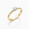 Elegant solitaire diamond ring on white